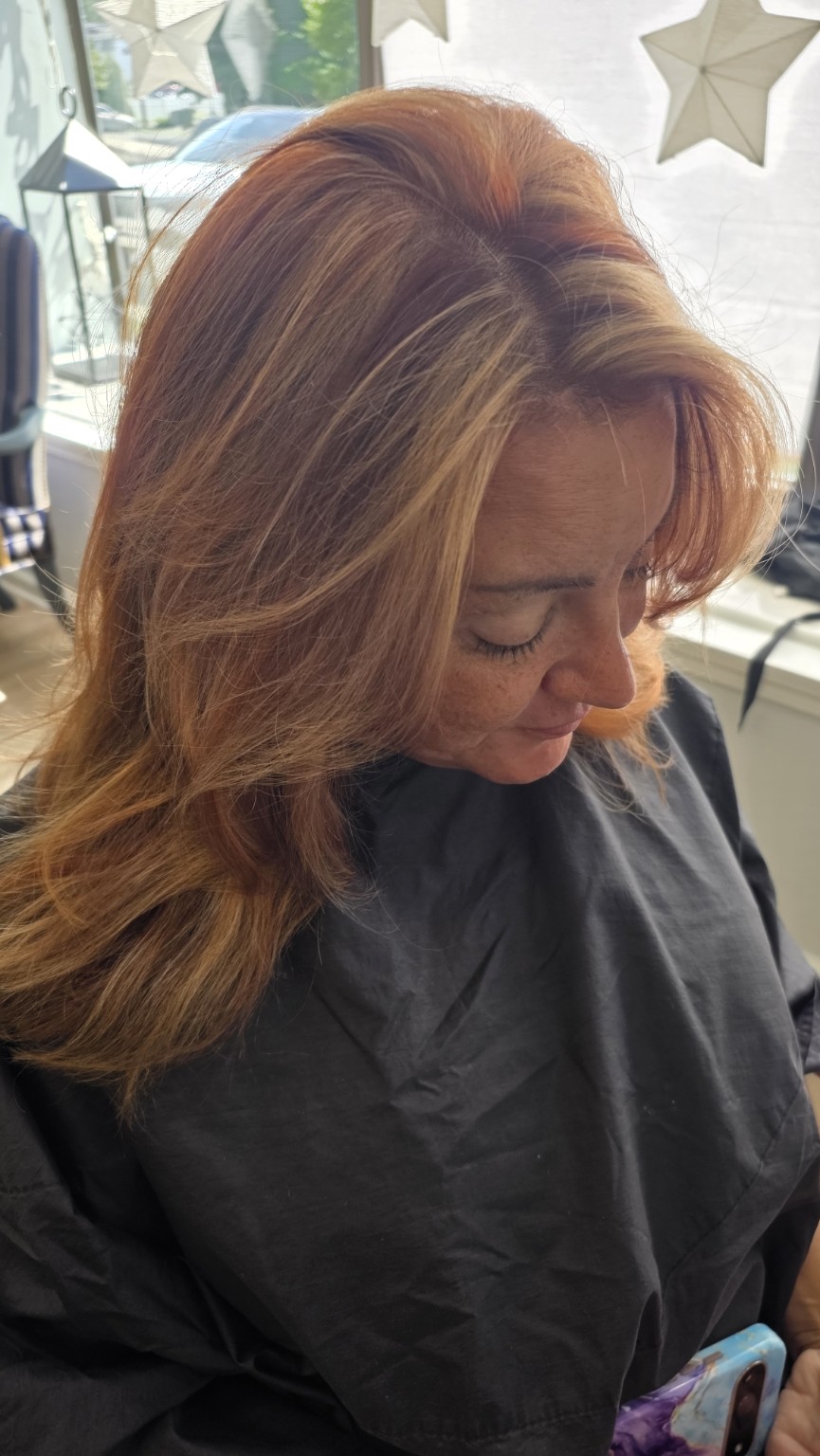Dimensional auburn color and styling by Tara Carrano