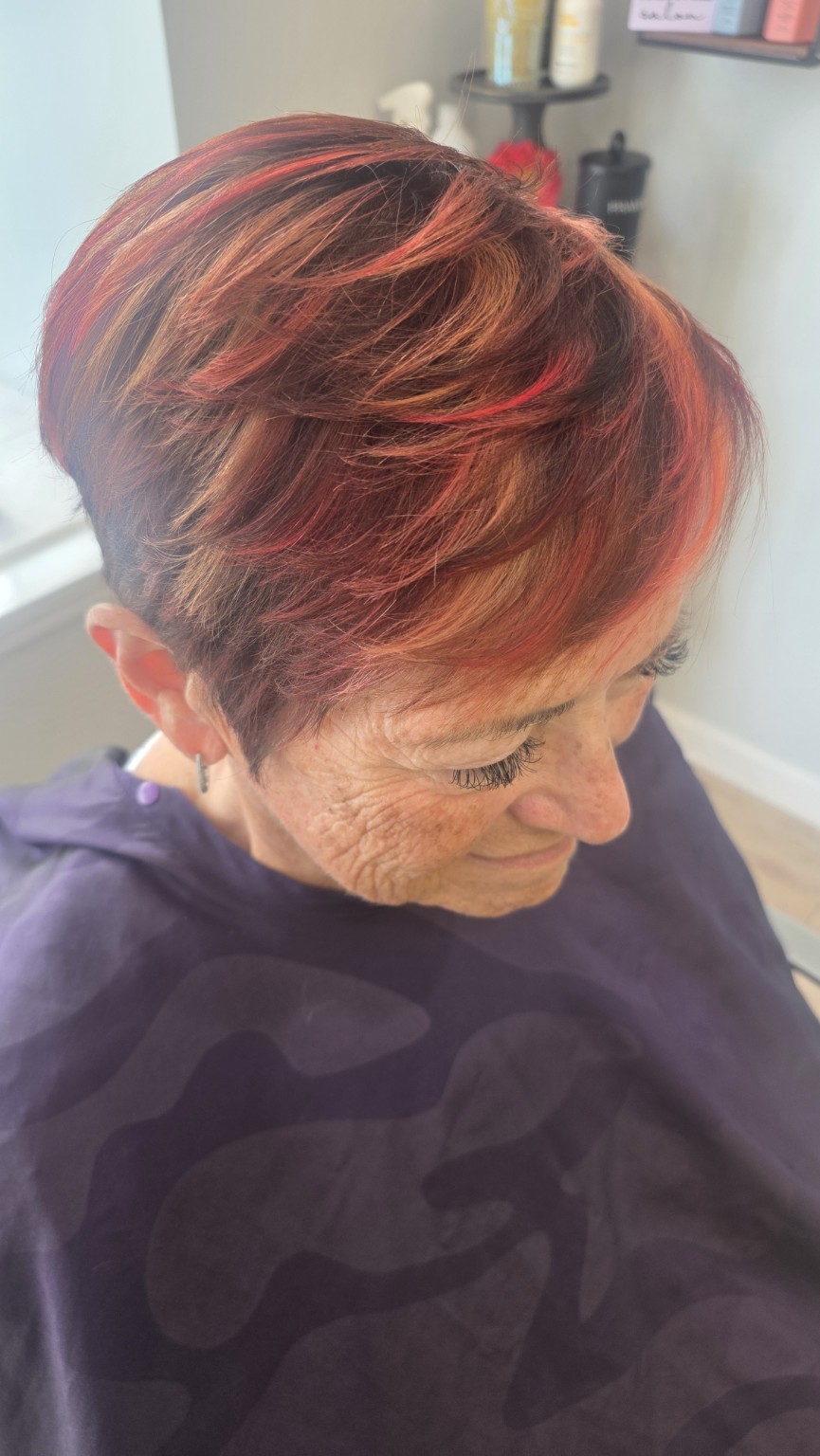 Short red dimensional pixie cut by Tara Carrano